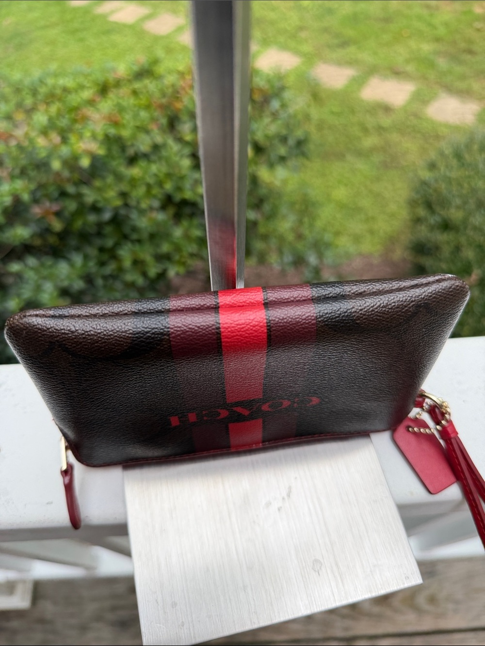 COACH Signature Stripe Zip Wristlet in Brown and Red - Picture 15 of 16